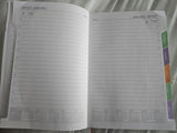 Inside pages of 2027 day-to-page diary with monthly tabs